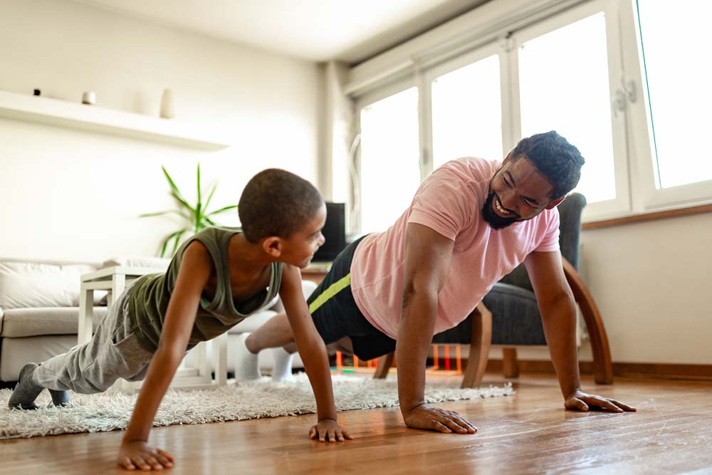 Father and son, home exercising