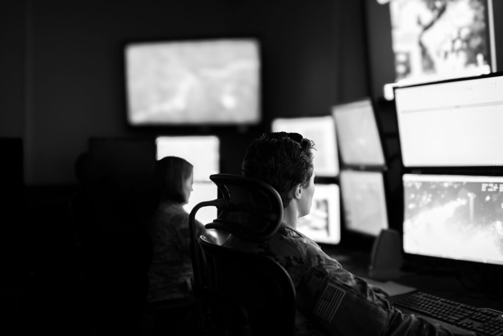 intelligence team reviewing screens
