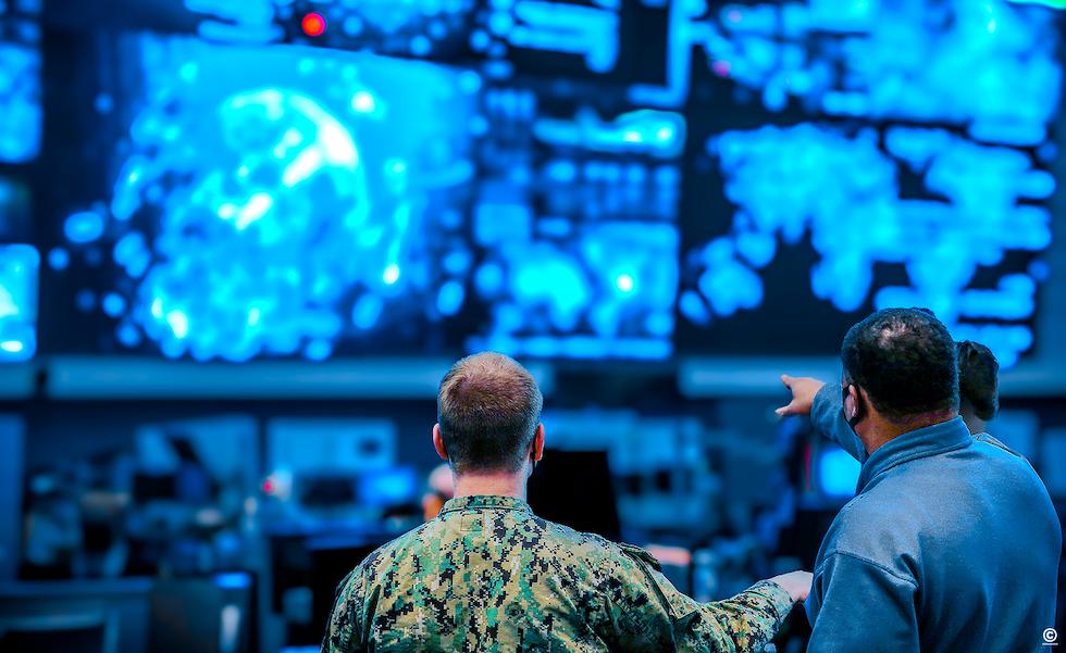 military intelligence reviewing data