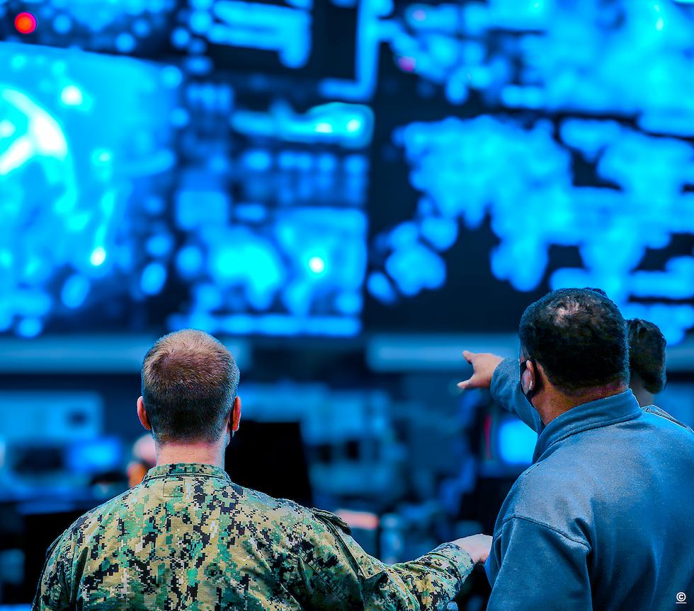military intelligence reviewing data