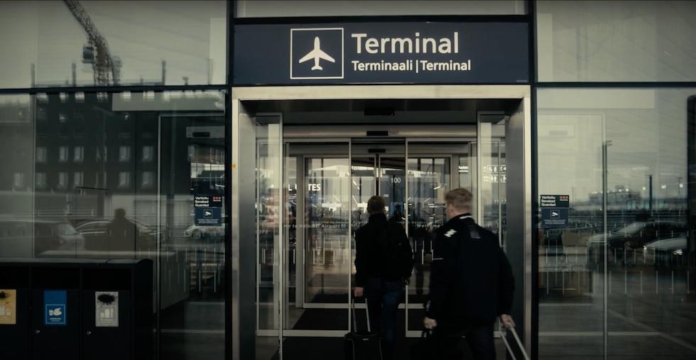 People walking into airport